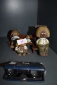 A selection of vintage Scandinavian ceramic troll figures and a set of Mignon opera glasses