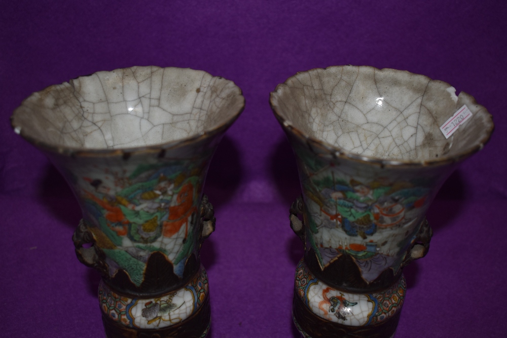 An impressive pair of Chinese export mantle vases in hard paste having extensive detailing of - Image 2 of 6