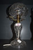 An early clear cut crystal table or side lamp having mushroomed dome top