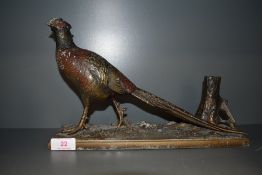 An antique spelter figure of a cock pheasant Austrian cold painted desk top or table cigarette