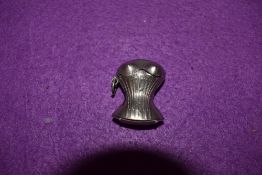 A white metal vesta case in the form of a womans bust in corset