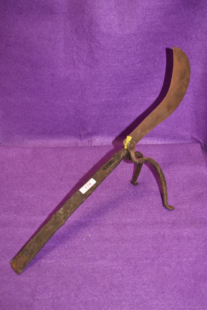 A wrought iron cooking knife possibly from India of similar middle eastern region