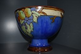 A Royal Doulton fruit bowl stamped and signed EB with harvest and fruit decoration