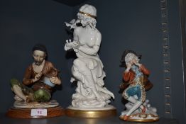 Three finely detailed and cast ceramic figures by Cappo De Monte