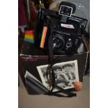 A Polaroid Super Colour Swinger II camera in original box