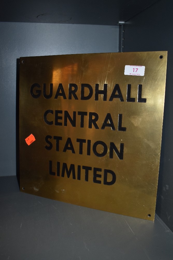 A brass cast plaque or sight for Guardhall central station