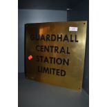 A brass cast plaque or sight for Guardhall central station