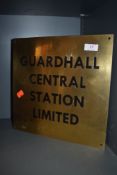 A brass cast plaque or sight for Guardhall central station