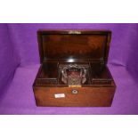 A mahogany veneer cased tea caddy or similar communion service set