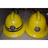 Two fire brigade helmets for the Cheshire area.