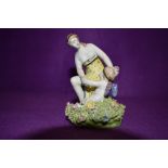 A 19th century antique Staffordshire ceramic figure base of maiden and angry cherub