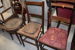 An early 20th Century bentwood chair and two Edwardian bedroom chairs