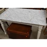 A traditional painted frame kitchen table having marble top, approx. 130 x 80cm