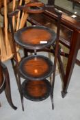 An early 20th Century mahogany cake stand, top handle broken