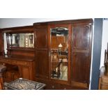 An early 20th Century mahogany mirror door wardrobe, approx dimensions W150cm H204cm D50cm