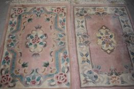 Two modern Chinese rugs, approx. 100cm x 60cm each (not including tassles)