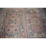 Two modern Chinese rugs, approx. 100cm x 60cm each (not including tassles)