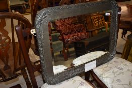 An Arts and Crafts style pewter framed mirror, approx. 63 x 48cm