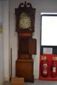 A 19th Century oak and mahogany long case clock, having 8 day movement, with painted arch dial, dual