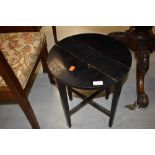 A rustic folding occasional table, open diameter approx. 38cm