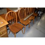 A set of four vintage , Ercol style (not labelled but stamped LE2056) , hoop and stick back