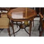 An Edwardian rosewood octagonal occasional table having typical inlay decoration, on square