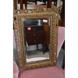 A late 19th/early 20th Century gilt framed wall mirror, approx. 62 x 40cm