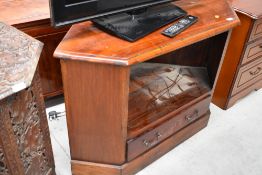 A hardwood TV stand, width approx. 100cm at widest point