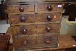 A Victorian scumbled pine dwarf chest of two over three drawers , approx. Width 53cm height 55cm