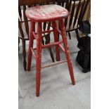 A traditional part stripped tall stool, height approx. 78cm