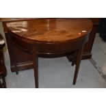 A 19th Century mahogany demi lune fold over table, approx width 91cm, open diameter 89cm , some