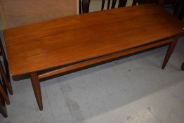 A vintage teak coffee table, approx. 129 x 52cm