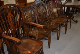 A set of five (four plus one) wheelback kitchen chairs