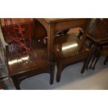 Two modern Regency style mahogany occasional tables, with glass tops, and a similar table with sun