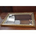 A gilt framed wall mirror, approx. 76 x 53cm