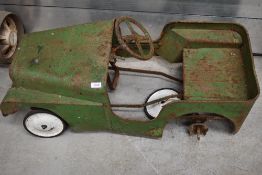 A 1960's Triang Land Rover toy pedal car, approx. length 93cm