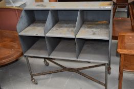 A vintage industrial metal parts or workshop/factory tool trolley, approx. width 91cm
