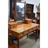 A Victorian dressing table in the Aesthetic style, approx. depth 54cm, width 122cm, on turned legs