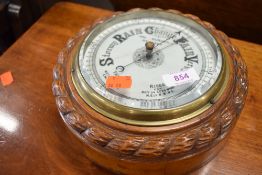 A traditional stained frame barometer , signed Jas?Murison, Renfrew