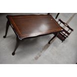 A reproduction Regency style mahogany coffee table and a rosewood effect magazine rack