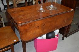 A 19th Century Pembroke style table, having draw to one end and dummy draw to other, on turned