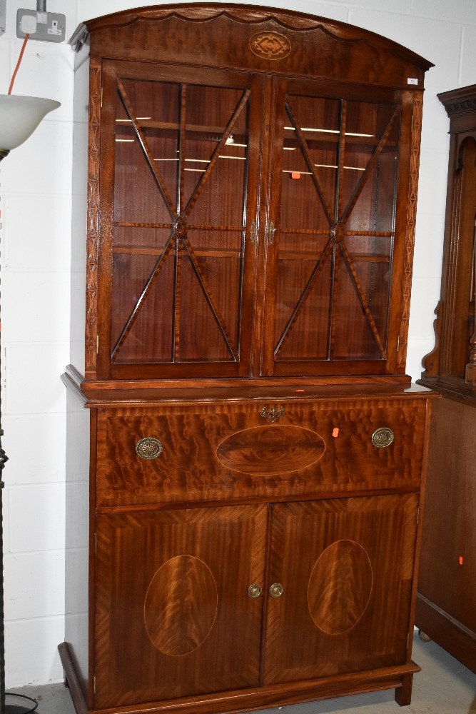 A reproduction Mahogany secretaire bookcase in the Regency style, approx. Dimensions W110cm H216cm