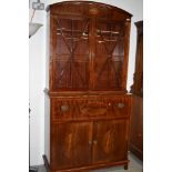 A reproduction Mahogany secretaire bookcase in the Regency style, approx. Dimensions W110cm H216cm
