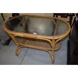 A vintage bamboo and glass coffee table, width approx. 84cm