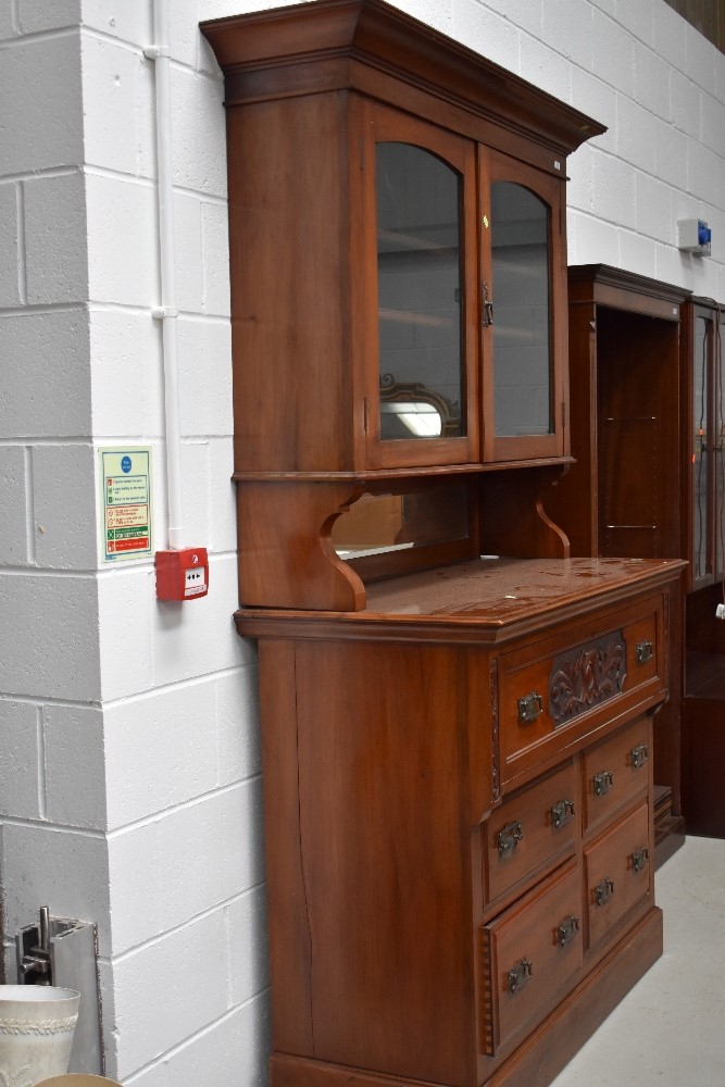 A late Victorian mahogany full height bookcase/secretaire having cornice top, display over