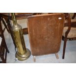 A vintage oak folding firescreen table