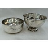 A silver bowl of plain form inscribed Hilarry 19.10.30, Birmingham 1928, William Neale, and a silver