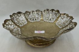A silver table basket of scalloped form having pierced butterfly decoration, Sheffield 1947, Viner's