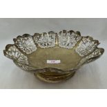 A silver table basket of scalloped form having pierced butterfly decoration, Sheffield 1947, Viner's