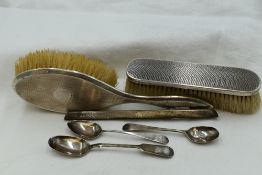 A small selection of HM silver including brushes with engine turned chequered decoration,
